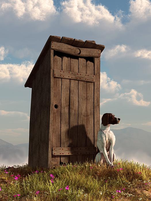 A dog standing guard in front of a wooden outhouse in a rural setting.